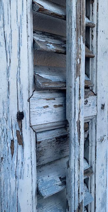 Contraventana de lamas