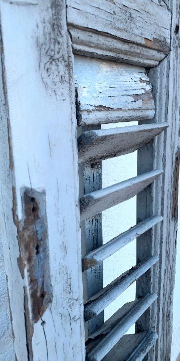 Contraventana de lamas