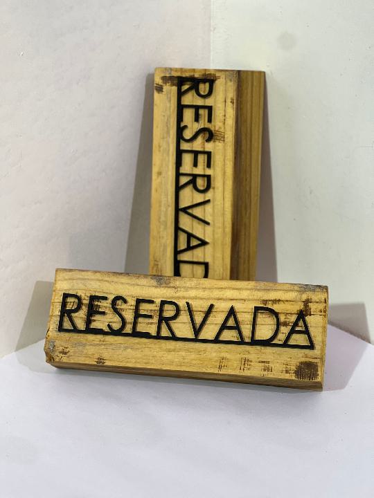 Cartelería reservado