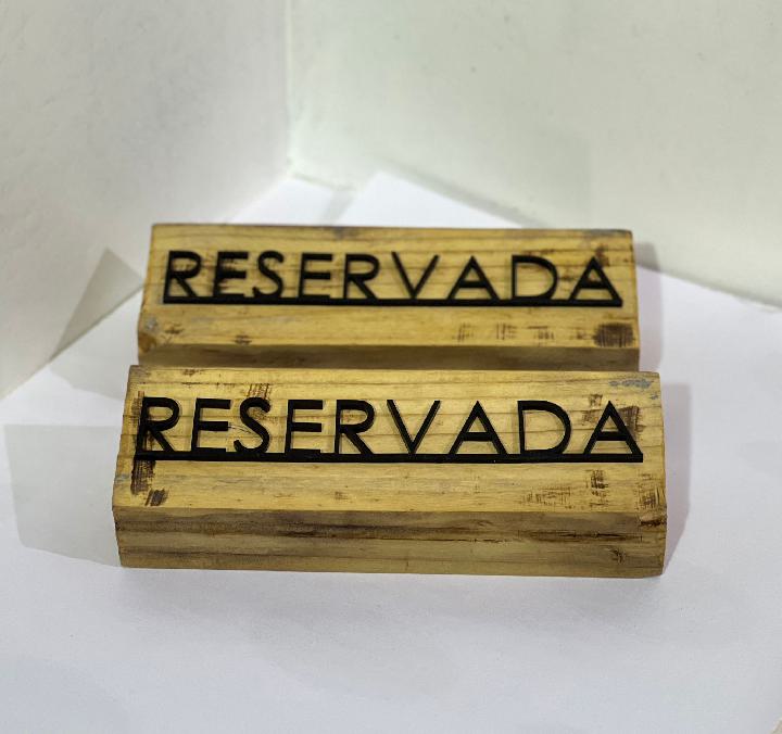 Cartelería reservado