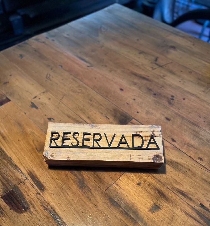 Cartelería reservado