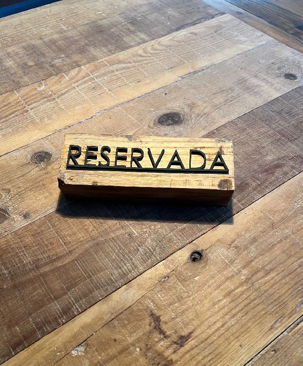 Cartelería reservado