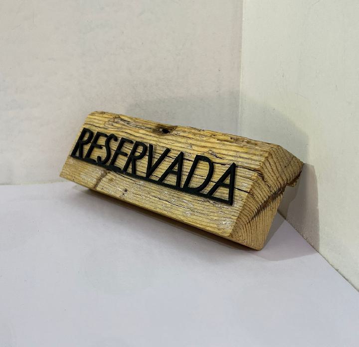 Cartelería reservado