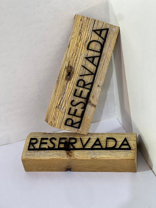 Cartelería reservado