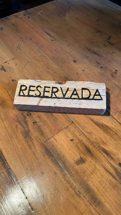Cartelería reservado