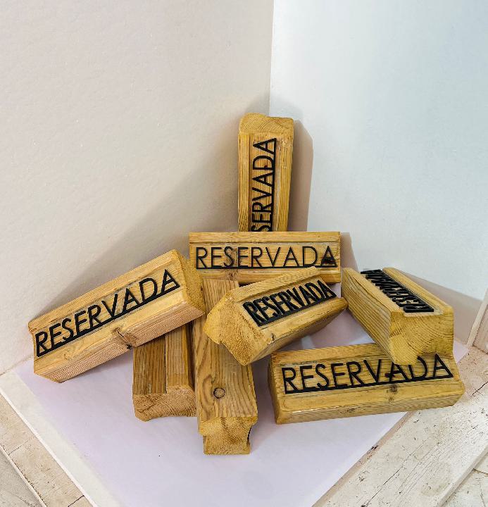 Cartelería reservado