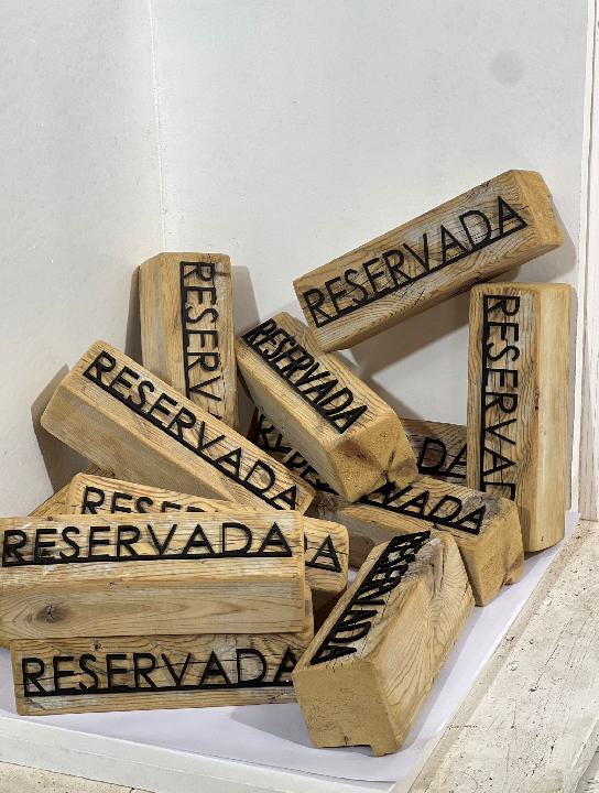 Cartelería reservado