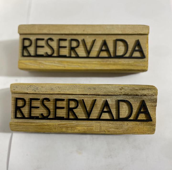 Cartelería reservado