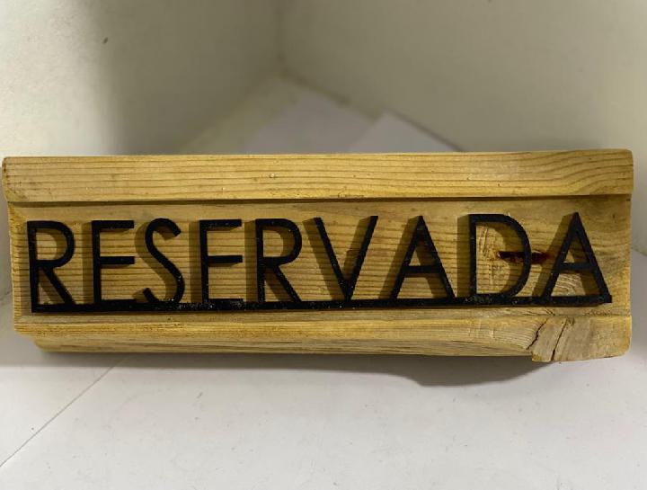 Cartelería reservado