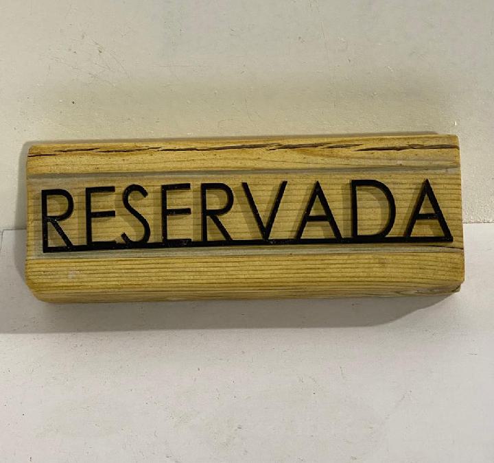 Cartelería reservado