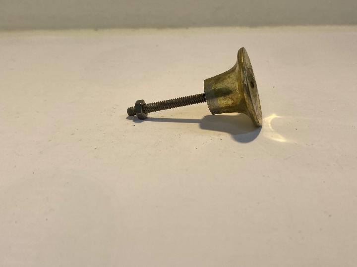 Tirador de botón